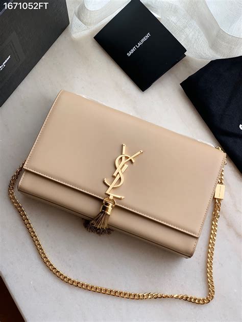 beige ysl bags|YSL beige bag with tassel.